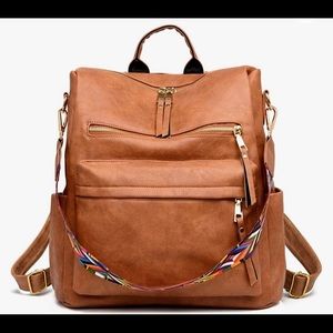 Cute backpack or shoulder bag! Like new, just was too small for my work junk!